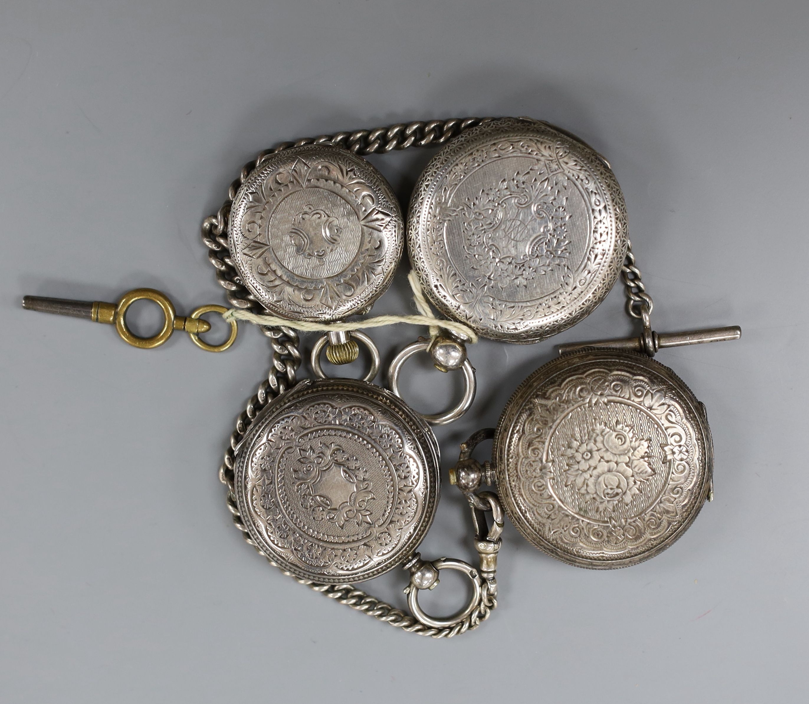 Four assorted late 19th century silver or white metal fob watches including two with case.